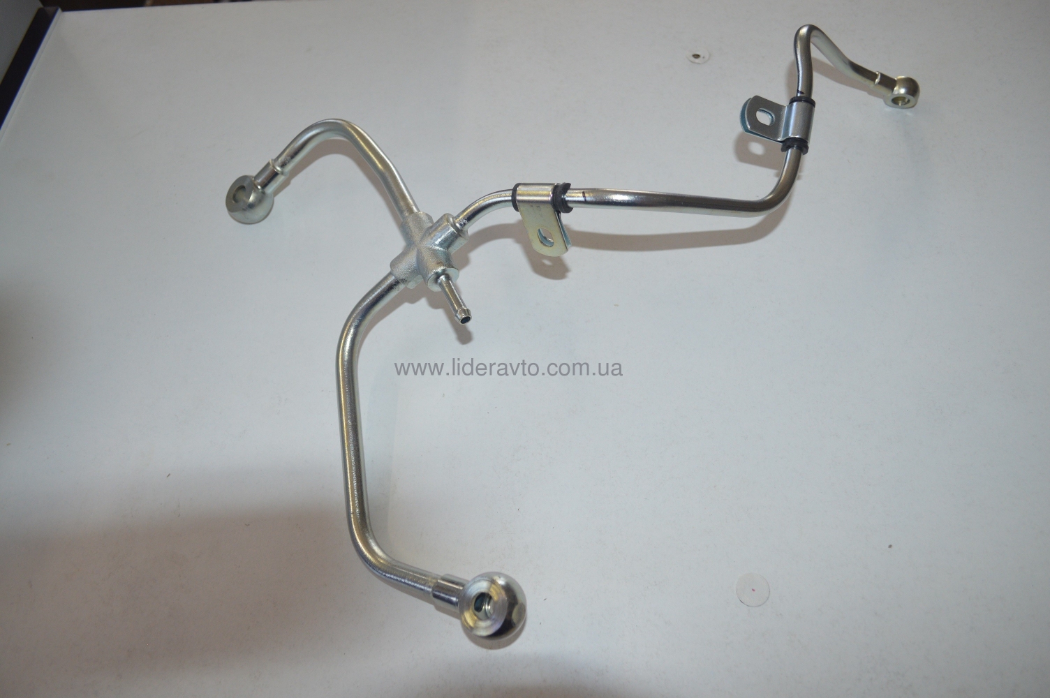 Трубка відведення палива від форсунок ISUZU 4НК1 БОГДАН АТАМАН Є-3 (павук) 8973722310